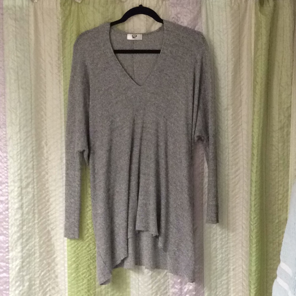 A slouchy, comfy, soft v neck flows boho style top